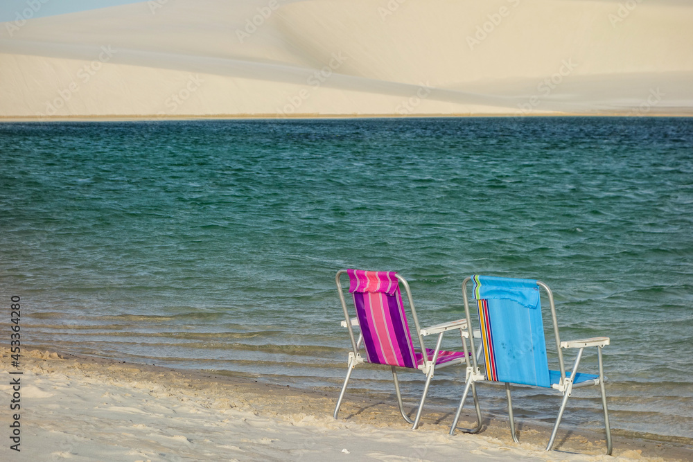 paradisiacal concept, rest and relaxation, tropical summer, blue water and white sand