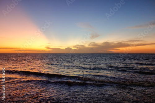 wonderful sunset with colors reflecting in the sky and the sea