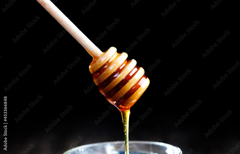 current thick and delicious sweet honey, close up current thick and delicious sweet honey, close up
