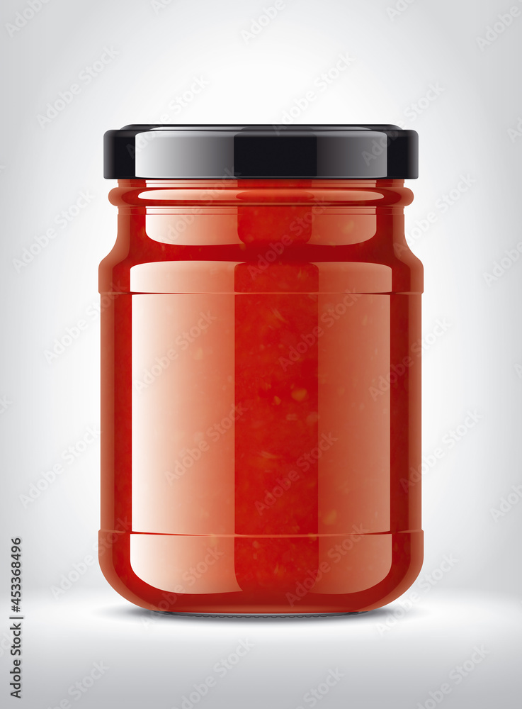 Glass Jar with Tomato Sauce on Background. Glass Jar with Tomato Sauce on Background.