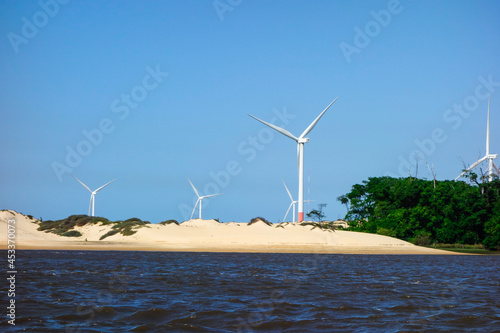 Pequenos Lencois, on Barreirinhas, Maranhao, Brazil. dunes and windmills on background photo