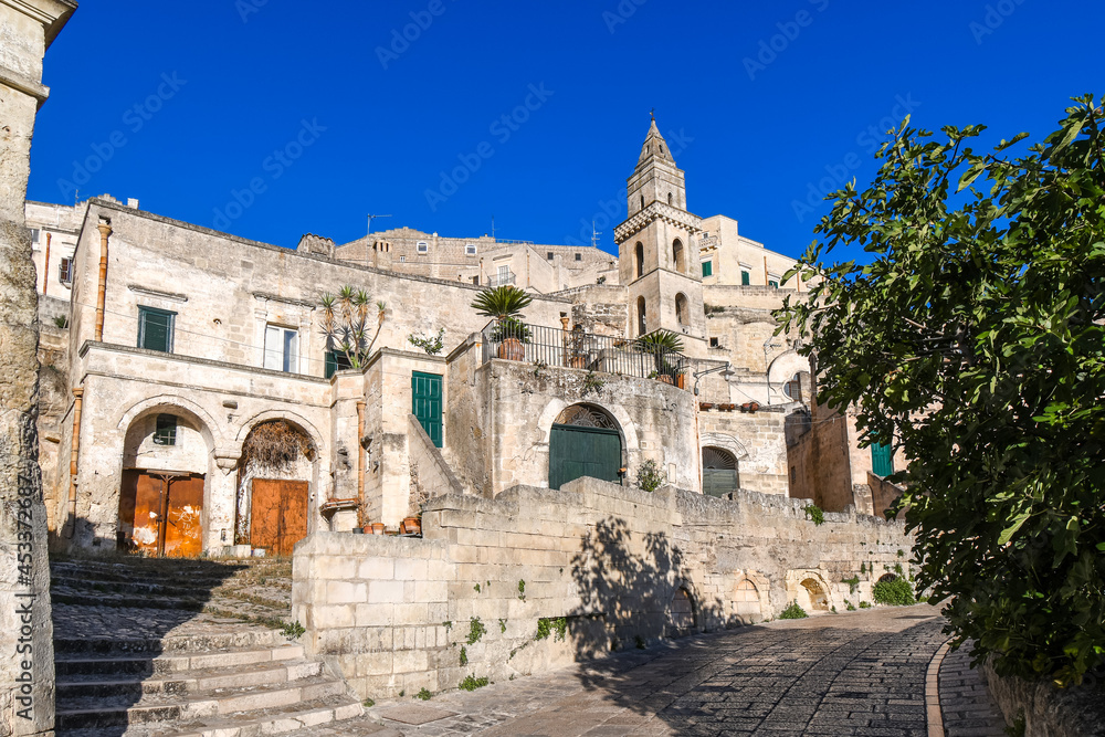 The bell tower of the Chiesa di San Pietro Barisano, or Church of Saint Peter, in the sassi district of the ancient city of Matera, Italy.