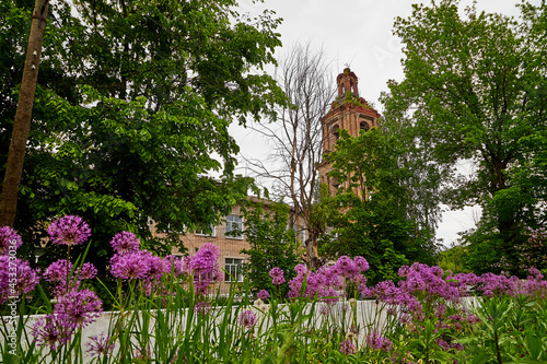 The bell tower of the Orthodox church, made of red bricks photo