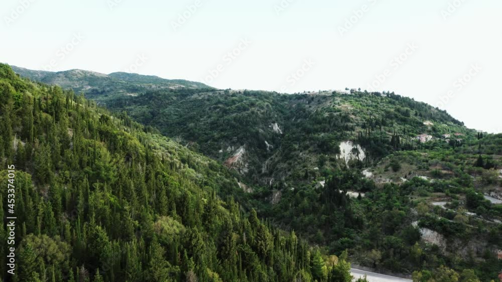 Drone shot of scenic green hills with tall cypress trees, ecology concept. Drone shot of scenic green hills with tall cypress trees, ecology concept.