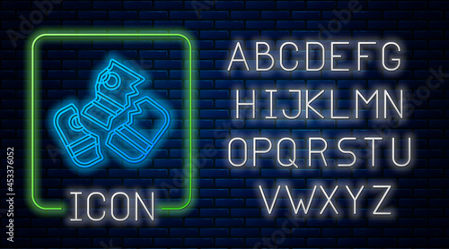 Glowing neon Scissors cutting a credit card icon isolated on brick wall background. Online payment. Cash withdrawal. Financial operations. Shopping sign. Neon light alphabet. Vector