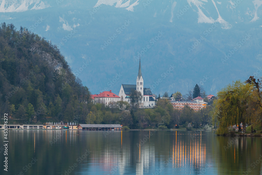 Lake Bled in the middle of the island with the church at sunset in the Triglav National Park, Julian Alps