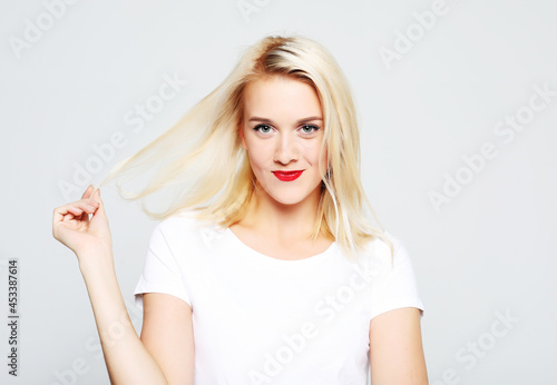 Portrait of cheerful pretty young woman
