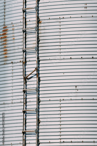 A broken rung on the ladder of a grain silo.