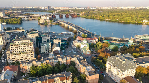 Aerial top view of Kyiv cityscape, Dnieper river and Podol historical district skyline from above, city of Kiev, Ukraine 