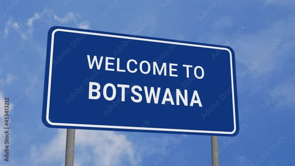 Welcome to Botswana Road Sign on Clear Blue Sky with Rapid Moving Clouds Welcome to Botswana Road Sign on Clear Blue Sky with Rapid Moving Clouds