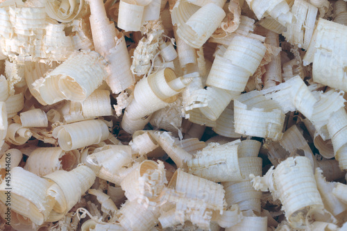 Background - Wood shavings made by a plane.