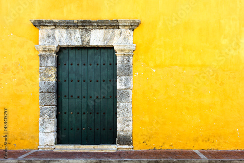 Yellow colonial style wall in Cartagena de Indias, Colombia
