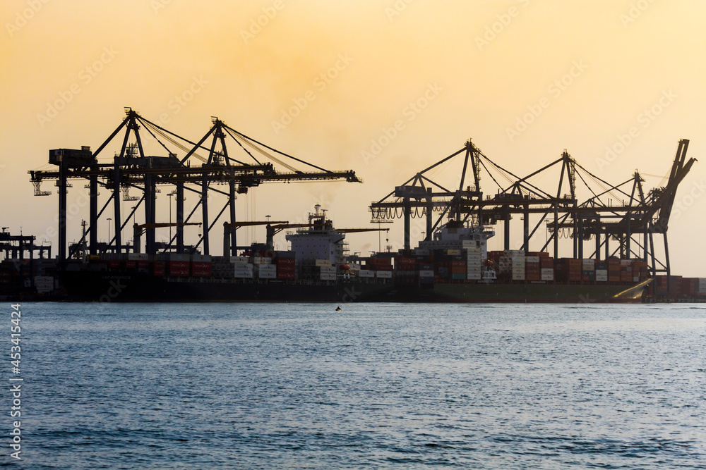 Cranes and Vessels at international port of Cartagena de Indias
