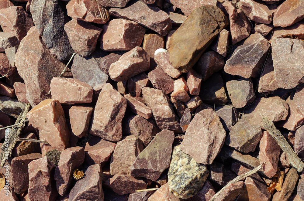 Crimson Quartzite. Chipped rubble stone. Random pieces of red st Crimson Quartzite. Chipped rubble stone. Random pieces of red st