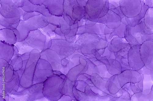 Paint stains background. Transparent purple stains. Alcohol ink texture. Violet color fluid splatter. Grungy purple ink overlay.