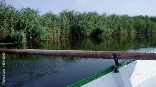 Boat movement and rowing in summer on the river. Leisure