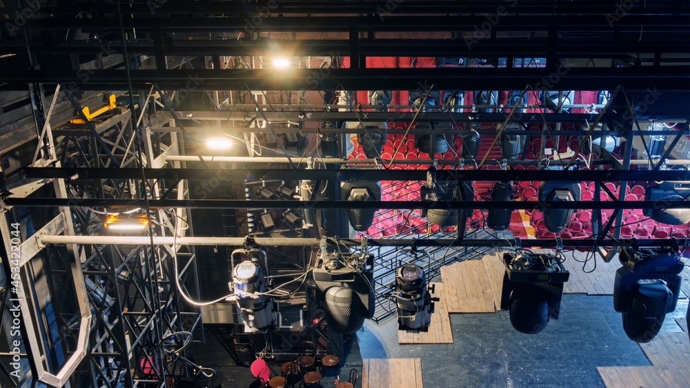 Technical equipment at the backstage of theater. Stage spot lighting