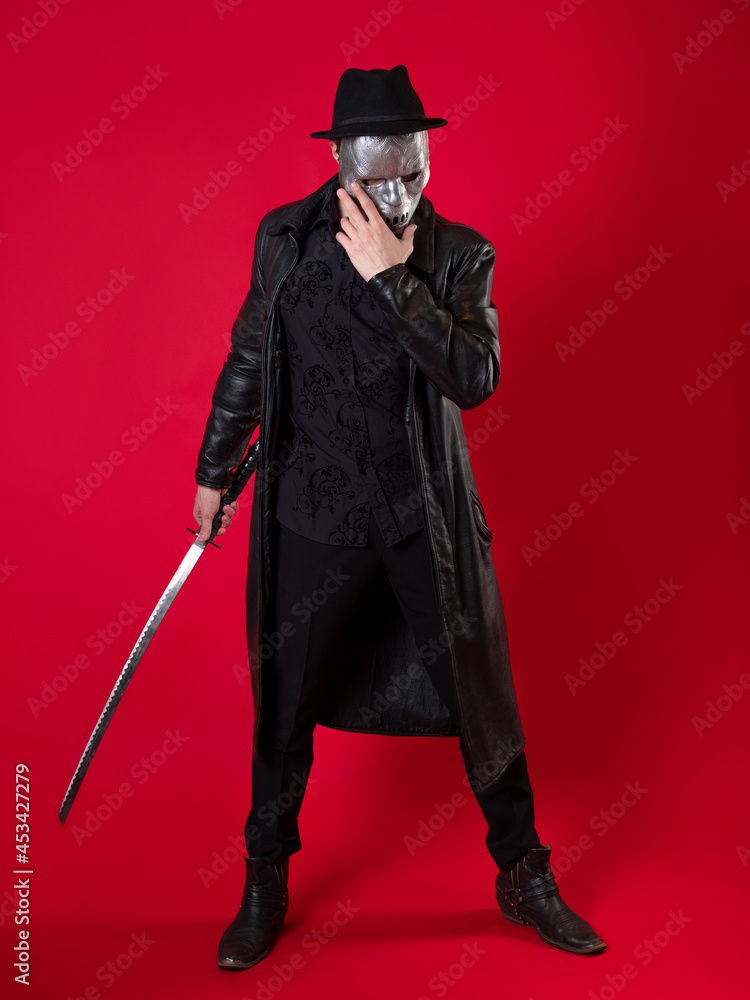 A mysterious ninja assassin in a noir style. A man in black clothes A mysterious ninja assassin in a noir style. A man in black clothes