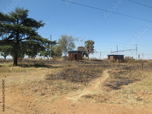Desolation is evident in these abandoned buildings that have been derelict for some years due to lack of maintenance and neglect, what was once a bustling siding is now a place of no human activity,.