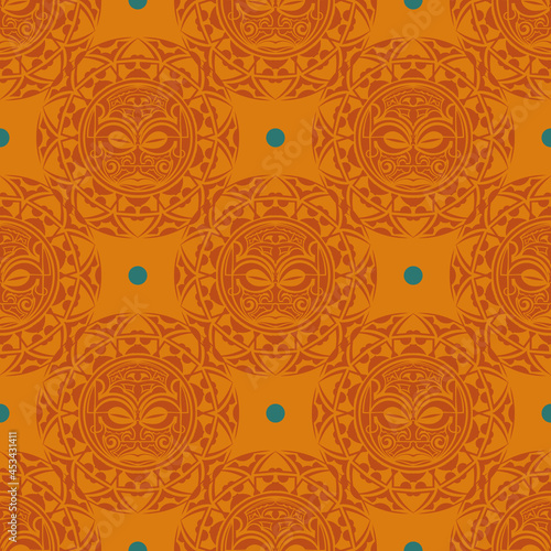 Orange seamless pattern with masks of the Polynesian tribes. photo