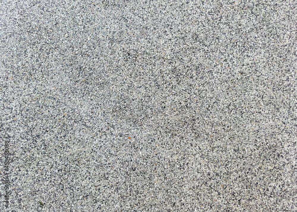 Exposed Aggregate Finish floor background and texture. Grey color terrazzo floor Exposed Aggregate Finish floor background and texture. Grey color terrazzo floor
