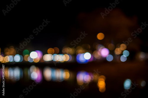 Blurred Street night pedestrians. © peterkai