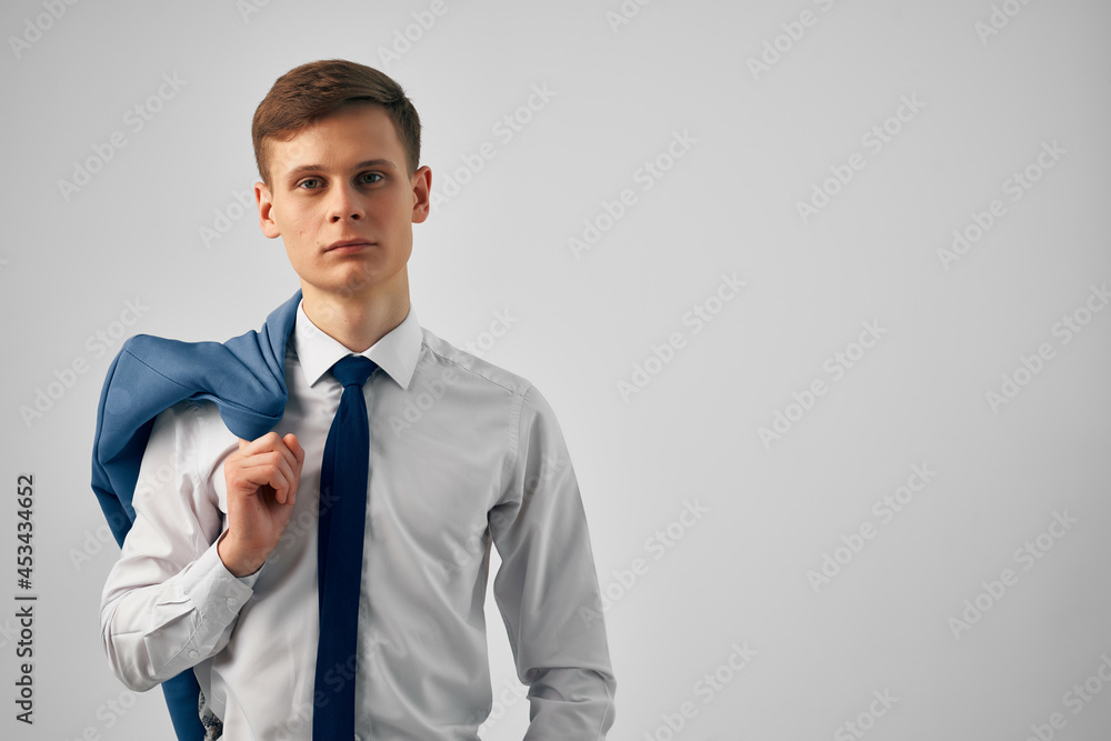 man in shirt with tie and jacket on his shoulders fashion work man in shirt with tie and jacket on his shoulders fashion work