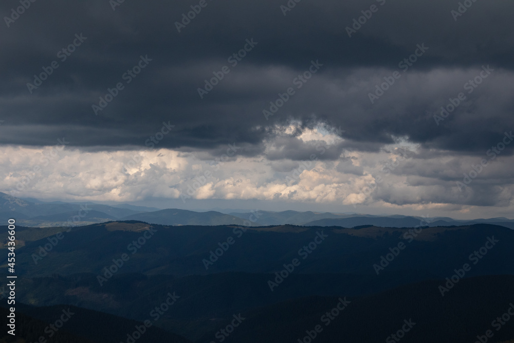 gray clouds in the mountains before storm