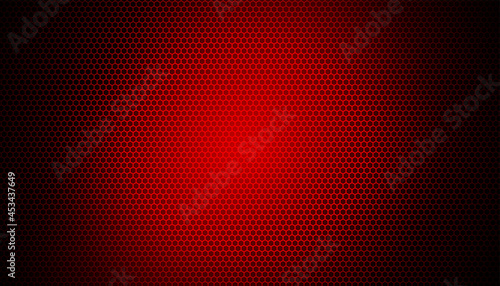 glowing red light on carbon fiber background