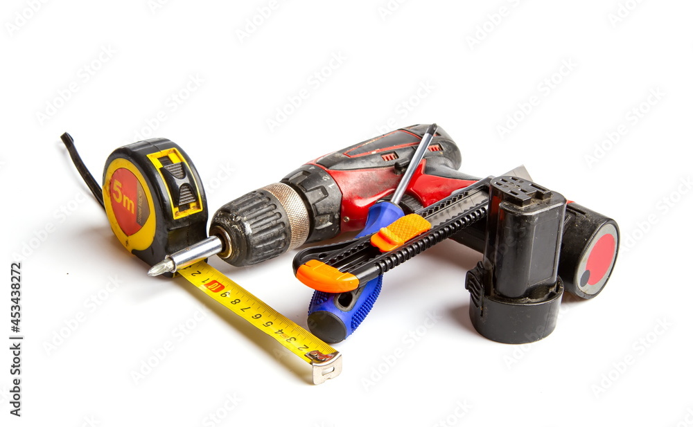 set of old used but necessary household tools on a white background set of old used but necessary household tools on a white background
