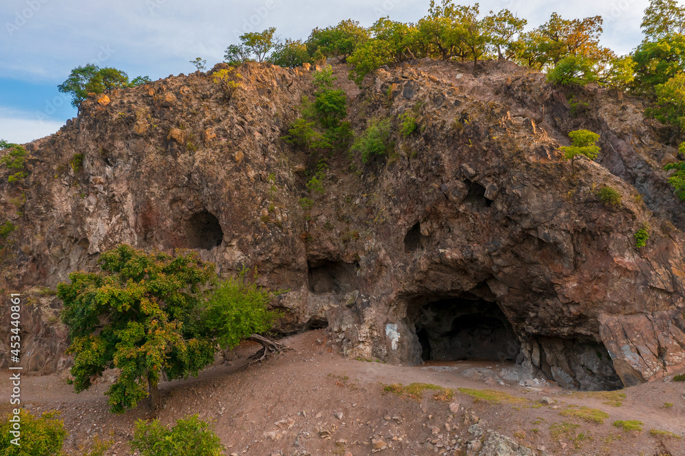 Aerial photo about hermit caves in Danube bend. Fantastic ancient cave in Borzsony mountains Hungary.  Untachable nature place next to Danube river. Hungarian name is remete barlangok