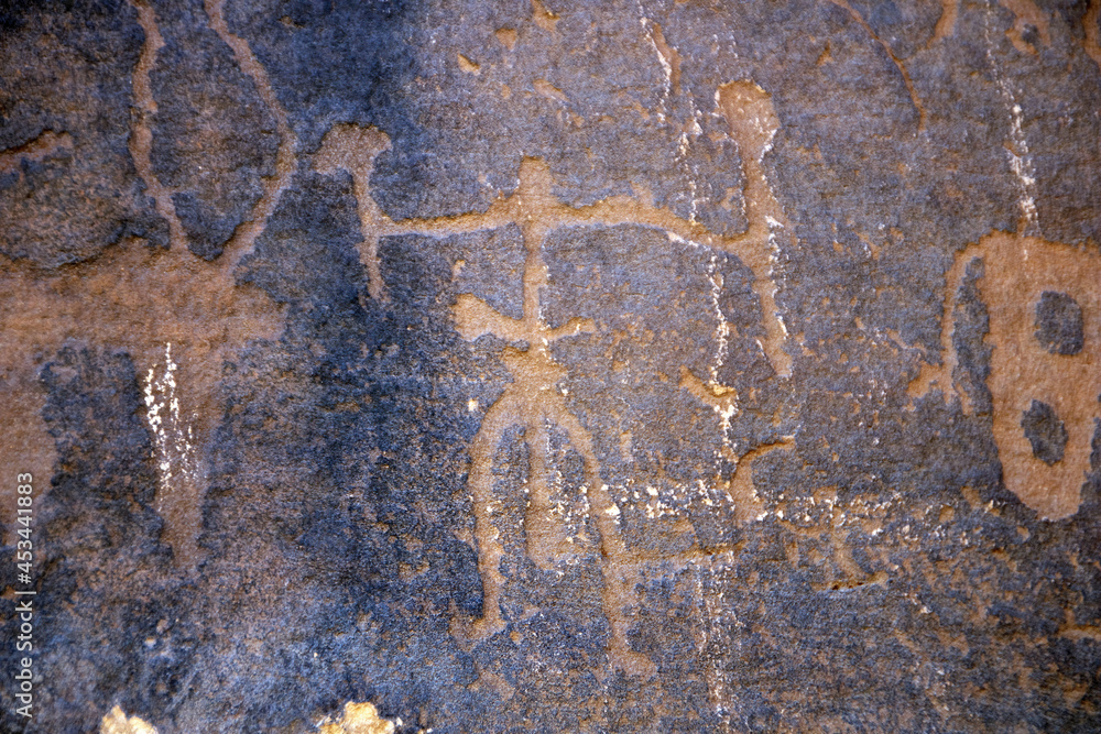 A petroglyphic image of a man holding tools, Graffiti Rocks (Qaryat al Asba), Musayqirah, Riyadh Province, Saudi Arabia