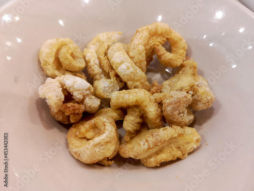 Pork snack, Pork scratching or pork crackling in a bowl , Thai food