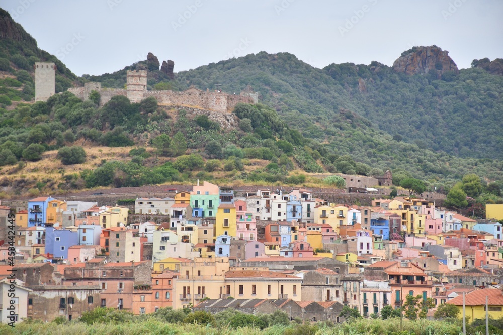 Distant view towards the colorful houses of Bosa, Sardinia, Italy