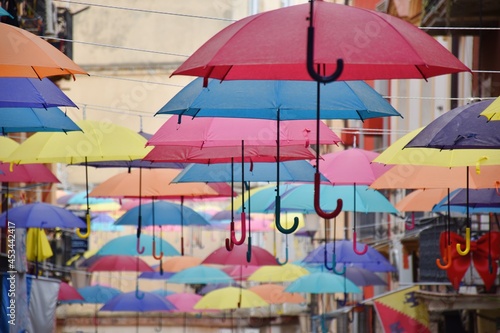 Wallpaper Mural Colorful umbrellas on the street in Iglesias, Sardinia, Italy Torontodigital.ca
