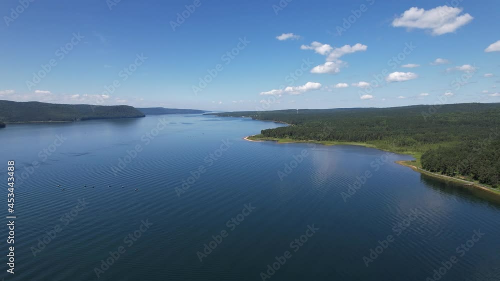 The Angara River is a major river in Siberia leaving Lake Baikal near the settlement of Listvyanka. Panoramic aerial view. The Angara River is a major river in Siberia leaving Lake Baikal near the settlement of Listvyanka. Panoramic aerial view.