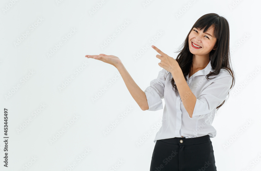 Smart young lady long hair white shirt black pant casual style. Standing smiling point up like showing sign, text, promotion with white background. Portrait good for index finger, advertise. Smart young lady long hair white shirt black pant casual style. Standing smiling point up like showing sign, text, promotion with white background. Portrait good for index finger, advertise.