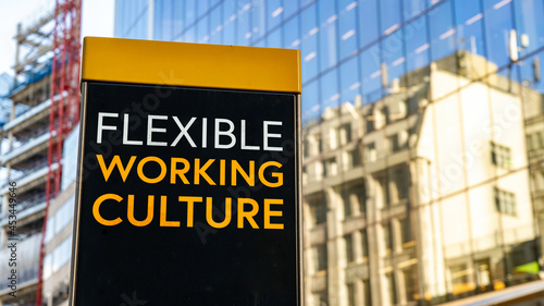 Wallpaper Mural Flexible Working Culture on a city-center sign in front of a modern office building Torontodigital.ca