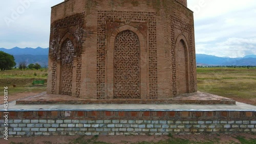 The ruins of the minaret. Burana Tower in Kyrgyzstan. Tokmok. photo