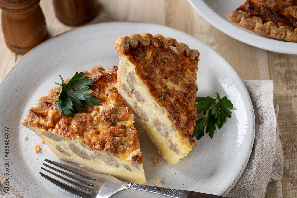 Two slices of sausage quiche Two slices of sausage quiche