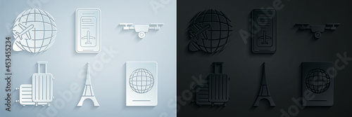 Set Eiffel tower, Drone flying with action video camera, Suitcase for travel, Passport biometric data, Smartphone electronic boarding pass airline ticket and Globe plane icon. Vector