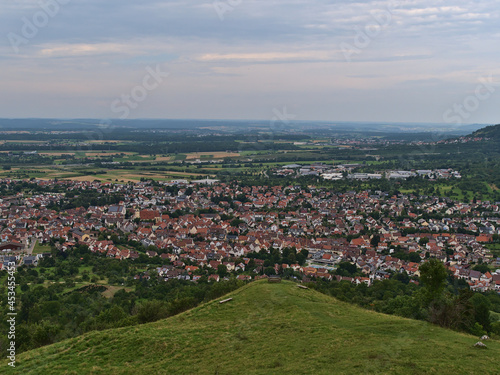 Aerial view of small town Weilheim an der Teck, Baden-Württemberg, Germany, located on the foothills of Swabian Alb, viewed from Limburg hill.