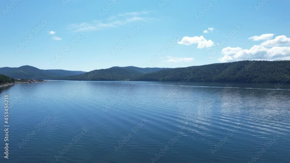 The Angara River is a major river in Siberia leaving Lake Baikal near the settlement of Listvyanka. Panoramic aerial view. The Angara River is a major river in Siberia leaving Lake Baikal near the settlement of Listvyanka. Panoramic aerial view.
