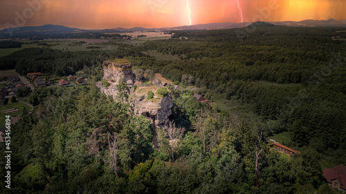 Ruins of the castle Jestrebi, region Ceska Lipa, Czech Republic. The castle dates from the 13th century, partly carved in the rock. photo