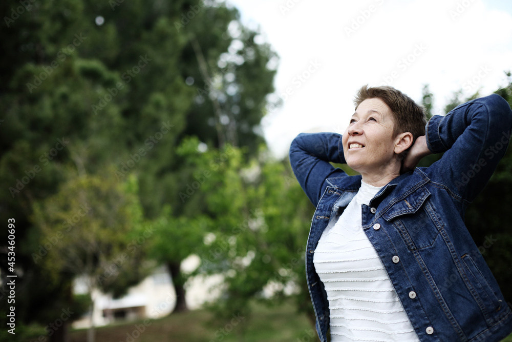Outdoor portrait of 50 years old woman Outdoor portrait of 50 years old woman