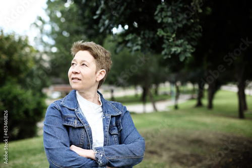 Outdoor portrait of 50 years old woman