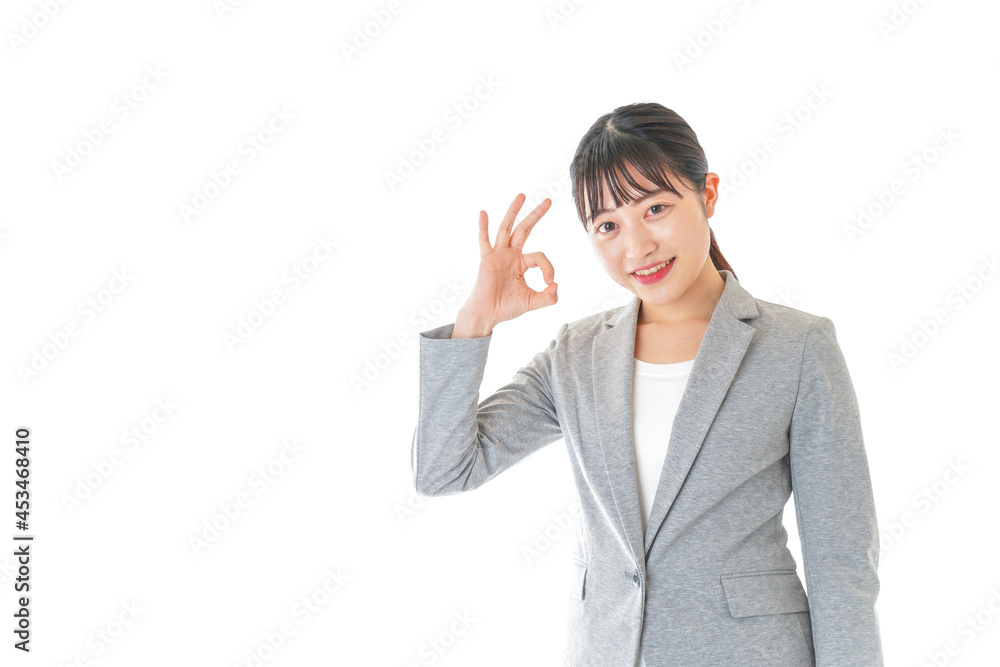 OKサインをするビジネスウーマン OKサインをするビジネスウーマン