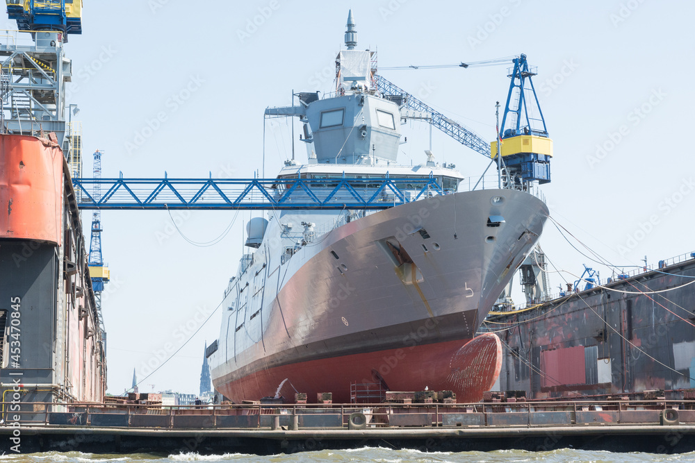 military ship repaired in a dry dock