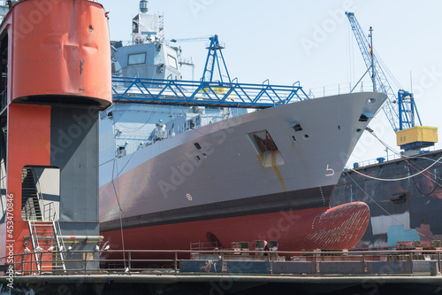 military ship repaired in a dry dock