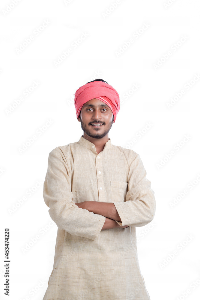 Young indian farmer standing on white background Young indian farmer standing on white background